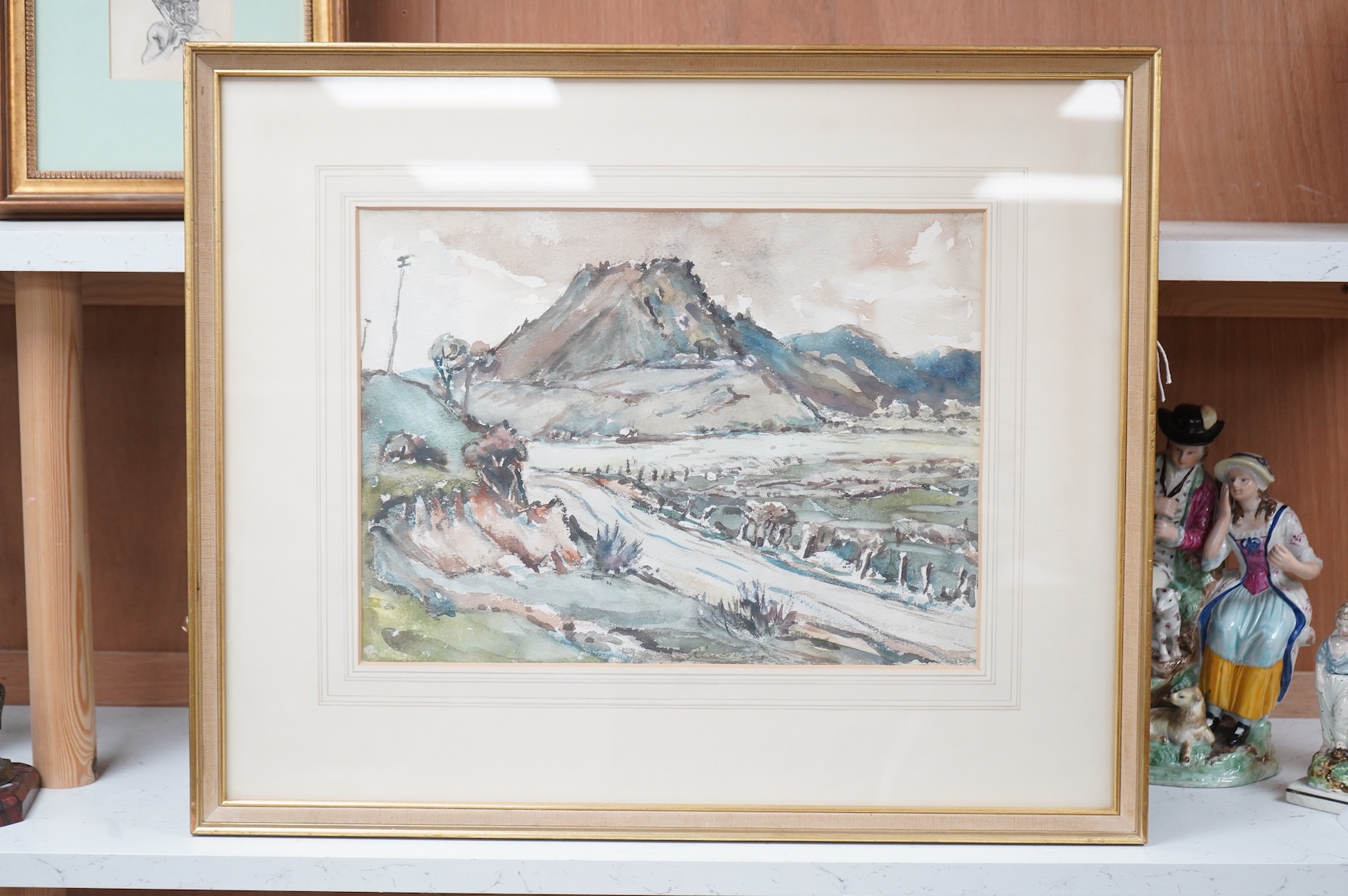 New Zealand Interest; Lincoln Lee (1885-1968), 'Tirohanga Hill, Opataki Coast', watercolour and a small ink and wash of a Maori warrior with a club, unsigned, largest 28 x 38cm